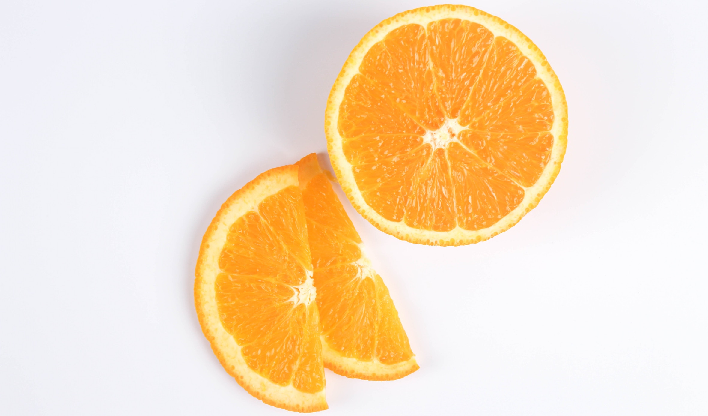 A sliced orange - Photo by Chang Duong on Unsplash